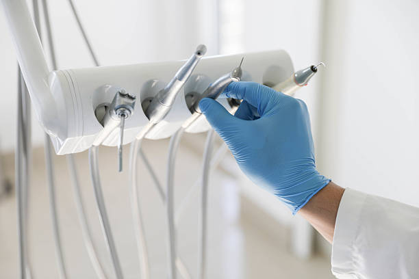 Professional Emergency Dentist technician working in Charlack, MO